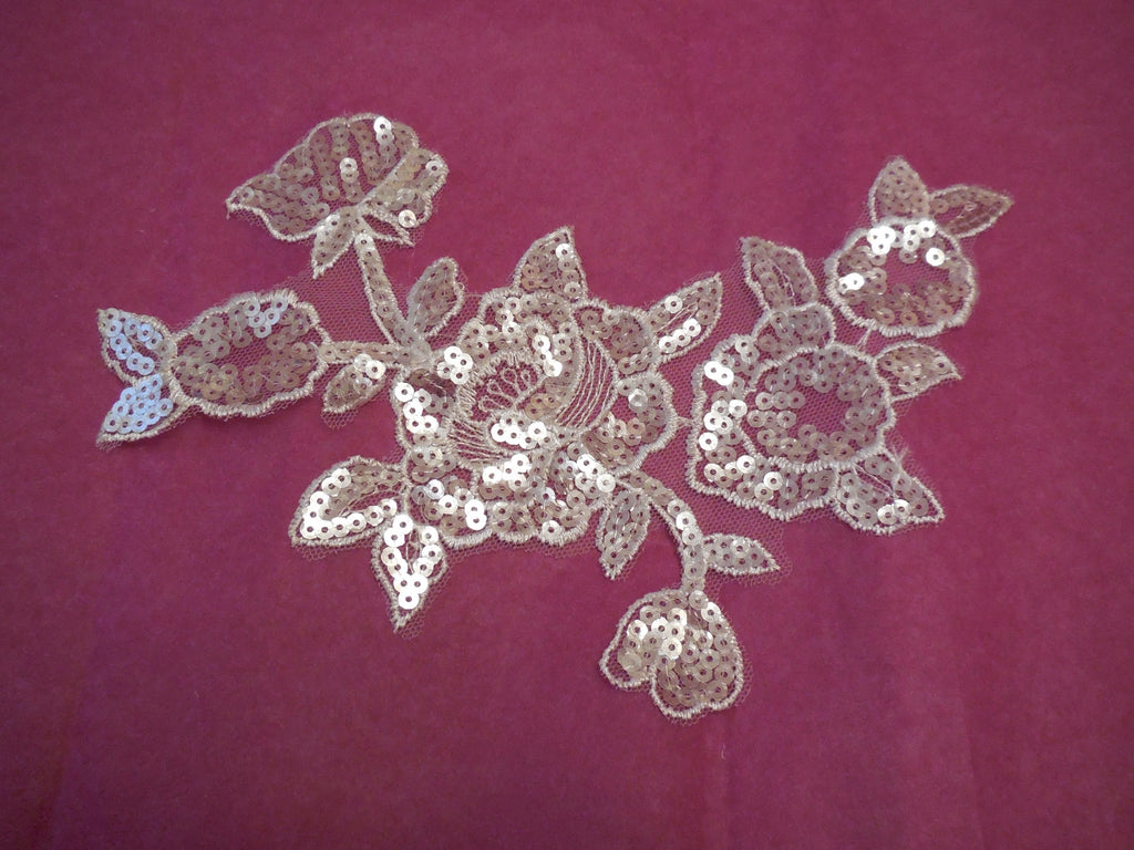 An Ivory bridal sequins floral lace Applique / bridal wedding ivory floral lace motif is for sale. Sold by per piece.