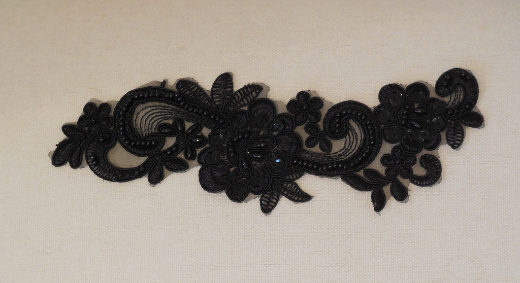 black beaded sequined lace applique / organza beaded floral lace motif is for sale . Sold by per piece