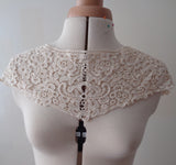 A piece of dark ivory cotton floral lace collar applique ivory collar sewing lace motif is for sale.