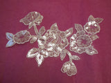 An Ivory bridal sequins floral lace Applique / bridal wedding ivory floral lace motif is for sale. Sold by per piece.