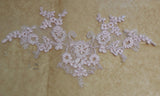 A baby pink or navy blue floral lace applique tulle lace motif is for sale. By piece