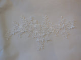 A piece of blue or black or white or ivory Bridal floral lace applique / dress lace motif is for sale