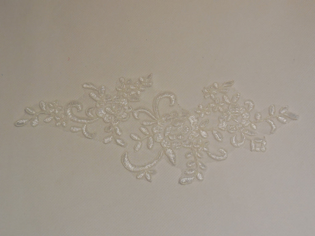 A Bridal wedding floral lace applique sewing tulle lace motif . Various colours