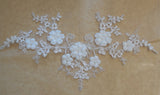 An ivory beaded floral lace applique bridal wedding floral tulle beads lace motif is for sale. Sold by per piece
