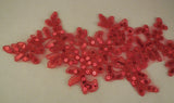 A red sequins floral lace applique red sequined lace motif approx. 24.5cm x 11cm is for sale. Sold by per piece.