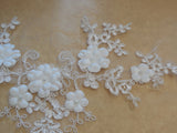 An ivory beaded floral lace applique bridal wedding floral tulle beads lace motif is for sale. Sold by per piece