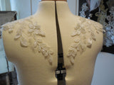 A Pair of dark ivory floral sequined lace collar appliques bolero lace motifs for sale. Sold by per pair 2 pieces