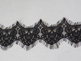A black eyelash style floral lace trim / soft cotton lace dress trim is for sale. Sold by per yard 90cm