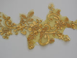 A gold sequined floral lace applique bridal wedding sequined tulle lace motif is for sale. sold by per piece