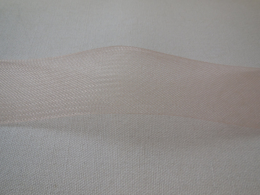 A meter of orange peach or sharp pink or champagne 5cm crinoline horse hair braid millinery hat trim is for sale. Sold by per meter.
