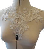 An ivory embroidered lace collar applique floral neckline collar tulle lace motif is for sale. Sold by per piece.