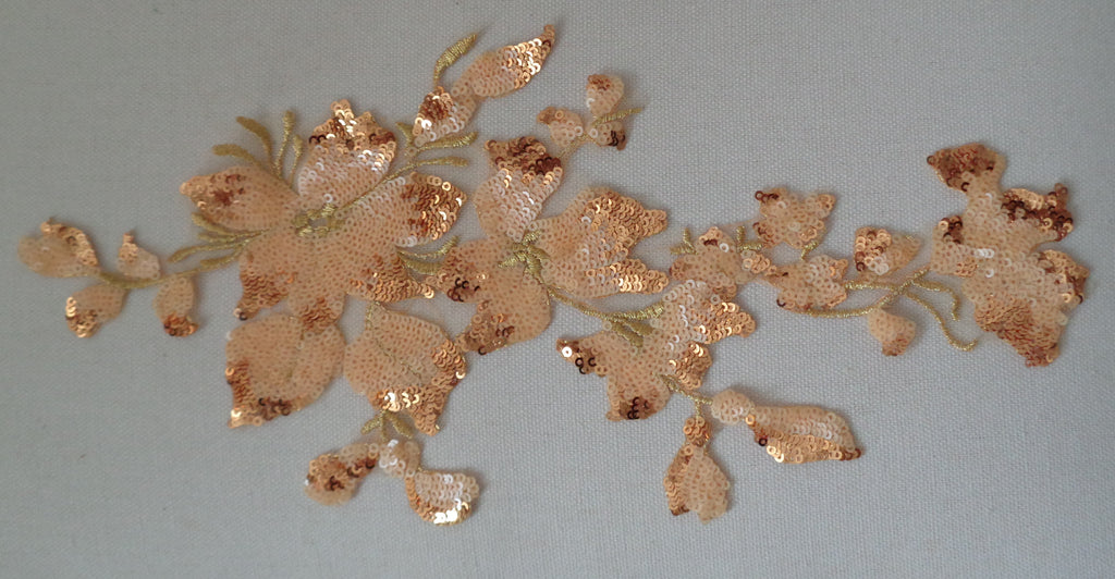 A piece of dress sewing sequined lace applique embroidered floral sequins lace motif is for sale. various colour options. Sold by per piece.