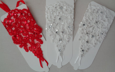 A pair red / white / ivory beaded wedding lace gloves floral bridal lace gloves is for sale. Sold By pair