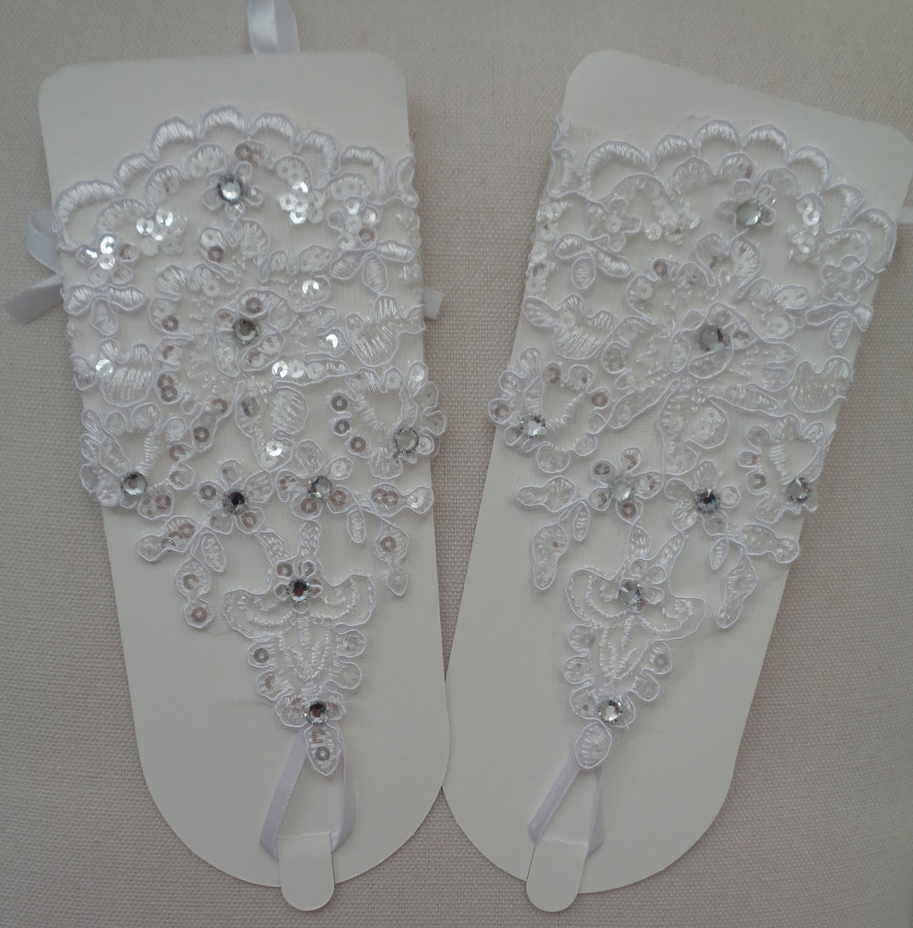 A pair red / white / ivory beaded wedding lace gloves floral bridal lace gloves is for sale. Sold By pair