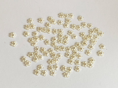 Craftuneed Bundle 91pcs Mini Acrylic Flower Embellishments Ivory 5-Petal Blossoms with Rhinestone Center for Crafts, Nail Art, DIY Projects