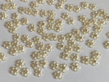 Craftuneed Bundle 91pcs Mini Acrylic Flower Embellishments Ivory 5-Petal Blossoms with Rhinestone Center for Crafts, Nail Art, DIY Projects