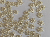 Craftuneed Bundle 91pcs Mini Acrylic Flower Embellishments Ivory 5-Petal Blossoms with Rhinestone Center for Crafts, Nail Art, DIY Projects