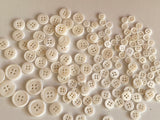 Craftuneed Bundle 145pcs sew on ivory shell plastic circle buttons 4 hole flat button