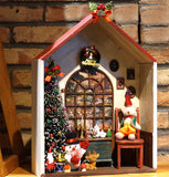 Craftuneed 1:6 scale Christmas Dollhouse Miniature Scene Wooden House with Tree Snowman Reindeer Bear & Festive Decor For Dolls