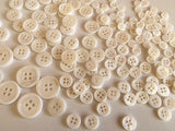 Craftuneed Bundle 145pcs sew on ivory shell plastic circle buttons 4 hole flat button