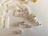 Craftuneed Bundle 136pcs gold silver colour alloy bracelet pendant charm ivory shell beads