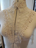 An ivory floral cotton lace embroidered collar applique vintage style lace collar motif is for sale. Sold by per piece