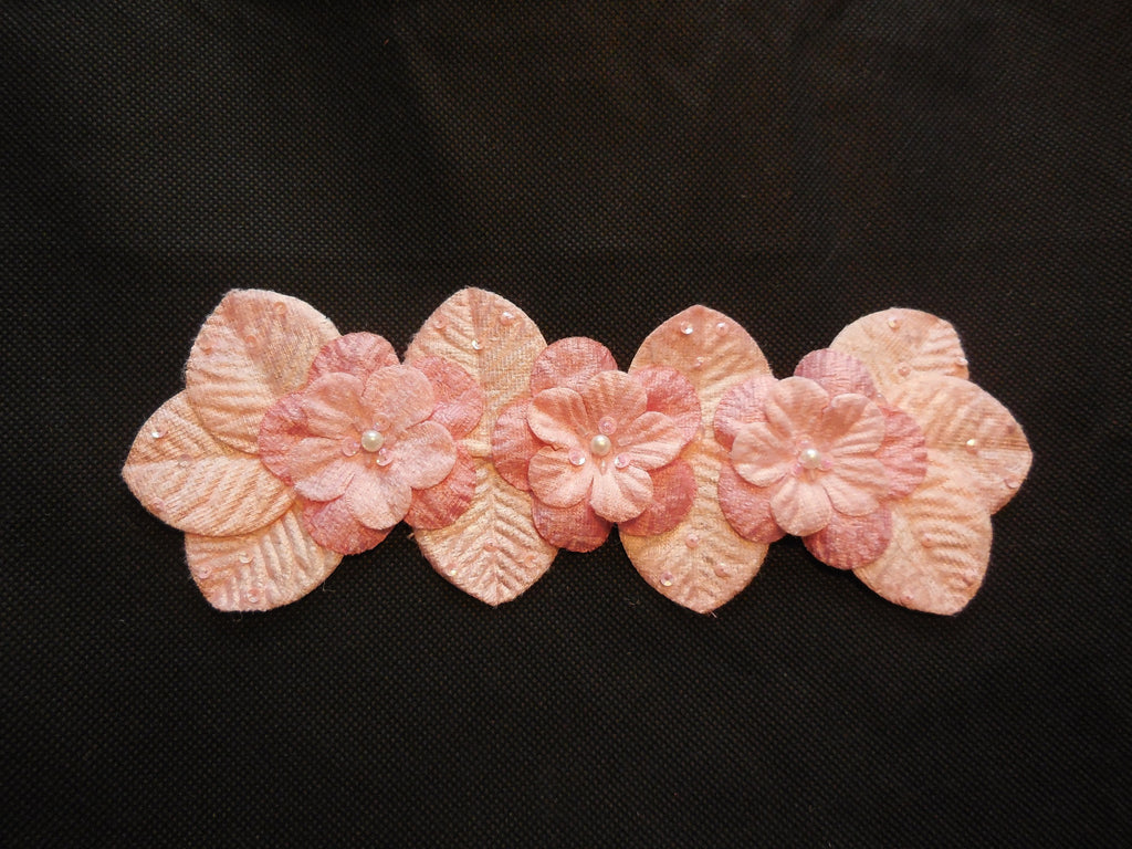 A peach pink beaded fabric floral motif / peach pink beaded floral applique is for sale. sold by per piece