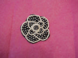 A Small piece of Ivory, grey & black  beaded floral applique /  black beaded lace motif is for sale. sold by per piece