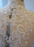 A large piece of ivory floral beaded lace applique bridal wedding bolero lace motif is for sale. Sold by per piece.