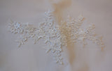 A piece of blue or black or white or ivory Bridal floral lace applique / dress lace motif is for sale