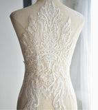 A large ivory bolero lace applique ivory bridal wedding embroidered floral lace motif is for sale. Sold by per piece