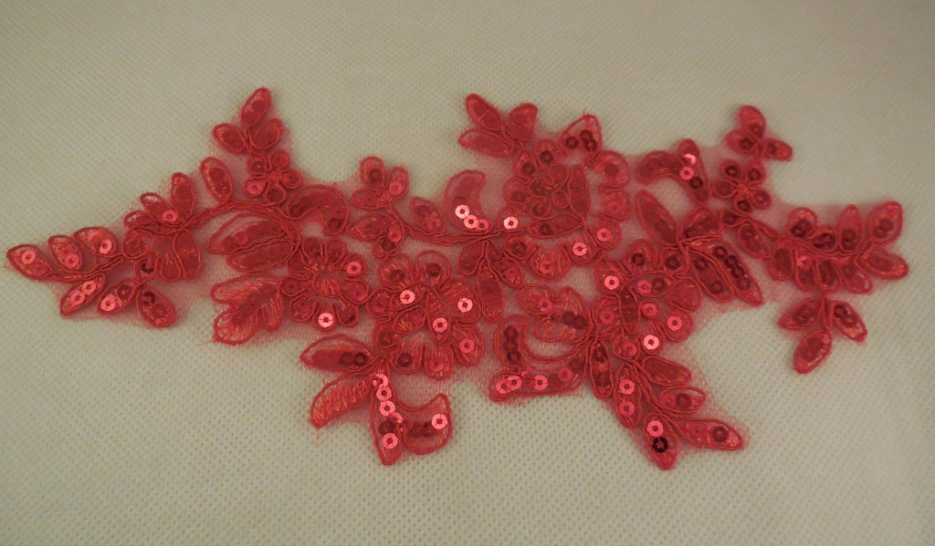 A red sequins floral lace applique red sequined lace motif approx. 24.5cm x 11cm is for sale. Sold by per piece.