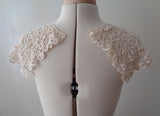 A piece of dark ivory cotton floral lace collar applique ivory collar sewing lace motif is for sale.