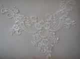 An ivory embroidered lace collar applique floral neckline collar tulle lace motif is for sale. Sold by per piece.
