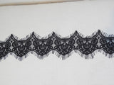 A black eyelash style floral lace trim / soft cotton lace dress trim is for sale. Sold by per yard 90cm