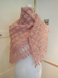 A pink tone handmade Shell stitch crochet women's scarf/shawl is for sale.