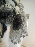 A black,white&grey tone handmade crochet floral women's scarf/shawl is for sale.