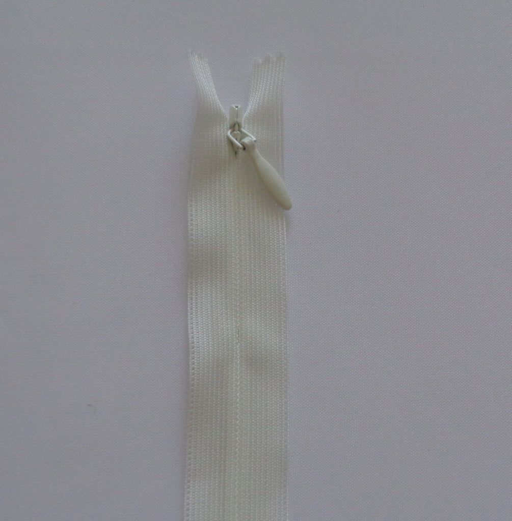 A black or ivory YKK zip invisible closed end zipper for sewing bridal /evening dress is for sale. Sold by per zip.