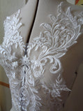 A piece of ivory sequined lace applique bridal wedding floral embroidered bolero lace motif is for sale. Sold by per piece