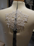 A piece of White floral cotton lace applique / bridal wedding bolero lace motif is for sale. Sold By piece