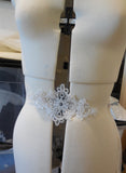 An off white bridal wedding floral sequins lace applique / off white sequined lace motif is for sale. Sold by per piece