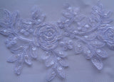 Large piece of white beaded sequins lace applique white bridal floral lace motif is for sale. Sold by per piece.