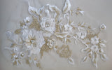 A large beaded floral lace applique / sequined tulle lace motif is for sale.  various colours . sold by per piece