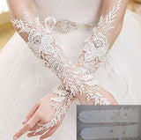 A pair of bridal ivory beaded lace gloves / wedding sequined floral lace gloves  is for sale. Sold By pair